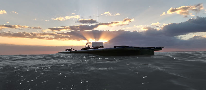 Wave Glider with BGAN at sunset