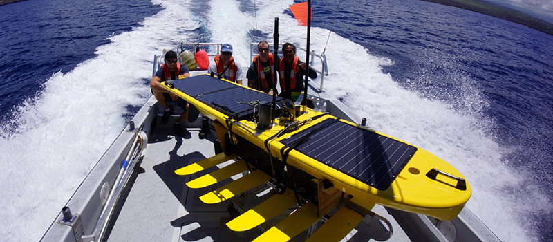 Wave Glider with crew on deck